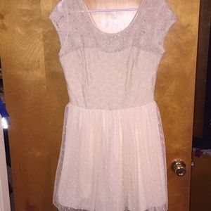 Cream patterned dress.
